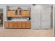 Kitchen featuring ample storage space and easy access to pantry and laundry at 15753 W Kino Dr, Surprise, AZ 85374
