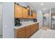 Kitchen with wooden cabinets, plenty of counter space, and modern appliances at 15753 W Kino Dr, Surprise, AZ 85374