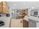 Bright kitchen featuring stainless steel appliances, tiled floors, and ample counter space perfect for cooking and entertaining at 15753 W Kino Dr, Surprise, AZ 85374