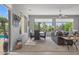 Bright living area with outdoor pool access and a dedicated dining space at 15753 W Kino Dr, Surprise, AZ 85374