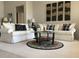 Inviting living room with plush seating, stylish decor, and ample natural light at 15753 W Kino Dr, Surprise, AZ 85374