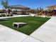 Community recreation area with cornhole and picnic tables at 16006 W Electra Ln, Surprise, AZ 85387
