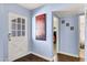 Light and airy entryway featuring hardwood floors at 1639 W Indianola Ave, Phoenix, AZ 85015