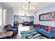 Spacious living room with hardwood floors, stylish decor and comfortable furniture at 1639 W Indianola Ave, Phoenix, AZ 85015