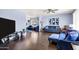 Spacious living room featuring modern furniture, hardwood floors, and natural light at 1639 W Indianola Ave, Phoenix, AZ 85015