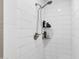 Modern shower with subway tile and shelving at 1639 W Indianola Ave, Phoenix, AZ 85015
