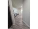 Hallway featuring hardwood flooring and an open layout at 17328 W Pinnacle Vista Dr Dr, Surprise, AZ 85387