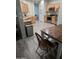 Bright kitchen featuring wood cabinets, stainless steel appliances, and hardwood flooring at 17328 W Pinnacle Vista Dr Dr, Surprise, AZ 85387