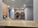 Well-appointed kitchen with wood cabinets, stainless steel appliances, and ample counter space at 17328 W Pinnacle Vista Dr Dr, Surprise, AZ 85387