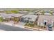 Aerial view of a beautiful single-Gathering home with a well-maintained yard and a three-car garage at 17815 W Straight Arrow Ln, Surprise, AZ 85387