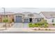 Charming single-Gathering home featuring a well-manicured front yard and a spacious three-car garage at 17815 W Straight Arrow Ln, Surprise, AZ 85387