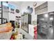 Organized garage with sink and fridge at 17815 W Straight Arrow Ln, Surprise, AZ 85387