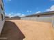 Large backyard with block fencing, offering privacy and space for your dream landscape at 19152 N Bandin Dr, Maricopa, AZ 85138