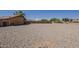 Backyard featuring gravel, and a block fence at 20761 N Herbert Ave, Maricopa, AZ 85138