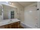 Full bathroom featuring a shower/tub, large mirror, and vanity with storage at 20761 N Herbert Ave, Maricopa, AZ 85138