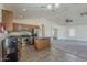 Spacious kitchen with stainless steel appliances, center island, and easy access to the living area, ideal for entertaining at 20761 N Herbert Ave, Maricopa, AZ 85138