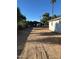 Large dirt backyard showing garage-like structure; xeriscaping for easy maintenance at 2148 W Hayward Ave, Phoenix, AZ 85021
