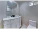 Charming bathroom featuring a custom vanity and updated fixtures at 2148 W Hayward Ave, Phoenix, AZ 85021