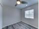 Bedroom featuring modern ceiling fan and window for ample natural light at 2148 W Hayward Ave, Phoenix, AZ 85021