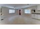Spacious living room features tile flooring, bright windows, and recessed lighting at 2148 W Hayward Ave, Phoenix, AZ 85021