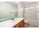 Well-lit bathroom featuring mosaic tile accents, vanity with sink, toilet, and shower-tub combination at 22672 W Solano Dr, Buckeye, AZ 85326