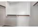 Spacious walk-in closet with ample shelving and rods for organization and storage of personal belongings at 22672 W Solano Dr, Buckeye, AZ 85326