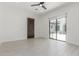 Bright bedroom offers a peaceful retreat with a view of the charming courtyard at 24372 N 96Th Ln, Peoria, AZ 85383