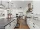 Gourmet kitchen featuring an oversized island, stainless steel appliances, and ample counter space for culinary creations at 24372 N 96Th Ln, Peoria, AZ 85383