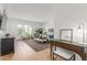Bright and airy main bedroom with a sitting area, large windows, and stylish decor at 24372 N 96Th Ln, Peoria, AZ 85383