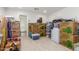 Spacious storage room filled with neatly organized boxes and containers for ample household storage at 24372 N 96Th Ln, Peoria, AZ 85383