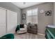 Cozy room with comfortable seating, a bright window, and ample natural light at 25289 N 143Rd Dr, Surprise, AZ 85387