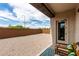 Inviting back patio featuring chairs and a covered area, perfect for outdoor relaxation and entertainment at 3053 W Straight Arrow Ln, Phoenix, AZ 85083