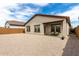 Spacious backyard offering ample space for customization and outdoor activities, enclosed by a brick wall at 3053 W Straight Arrow Ln, Phoenix, AZ 85083