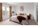 Cozy bedroom with natural light, neutral decor, and a comfortable bed, creating a serene and inviting atmosphere at 3053 W Straight Arrow Ln, Phoenix, AZ 85083
