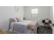 Comfortable bedroom featuring a full-size bed, side chair, and a relaxing space at 3053 W Straight Arrow Ln, Phoenix, AZ 85083
