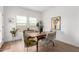 Bright dining room featuring a modern table, elegant chairs, and stylish décor at 3053 W Straight Arrow Ln, Phoenix, AZ 85083