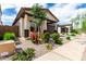 Charming home featuring a desert landscape with colorful bougainvillea and a neutral color scheme at 3053 W Straight Arrow Ln, Phoenix, AZ 85083