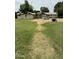 Large backyard featuring a expansive lawn with potential for landscaping and outdoor activities at 3102 E Backus Rd, Mesa, AZ 85213