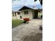 Backyard showing a property with an detached structure, driveway, and room for parking at 3102 E Backus Rd, Mesa, AZ 85213