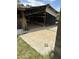 Open shed structure showing a large open area with a concrete foundation for storage at 3102 E Backus Rd, Mesa, AZ 85213