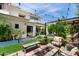 Inviting backyard with a fire pit, comfortable seating, and beautifully landscaped yard at 3511 N 39Th Pl, Phoenix, AZ 85018