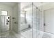 Bright bathroom featuring a tub, shower, and elegant tile floors at 3511 N 39Th Pl, Phoenix, AZ 85018