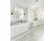 Bright bathroom with marble countertops, dual sinks, and a large mirror at 3511 N 39Th Pl, Phoenix, AZ 85018