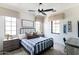 Comfortable bedroom with two windows and a ceiling fan at 3511 N 39Th Pl, Phoenix, AZ 85018