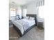 Bright bedroom with a comfortable bed and home exercise equipment at 3511 N 39Th Pl, Phoenix, AZ 85018