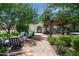 Beautiful courtyard with an outdoor grill and cozy firepit seating offers the perfect spot for community gatherings at 3511 N 39Th Pl, Phoenix, AZ 85018