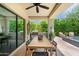 Relaxing covered patio with dining, grill, and view of the beautiful backyard at 3511 N 39Th Pl, Phoenix, AZ 85018