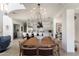 Cozy dining room with a wood table, chairs, and modern chandelier at 3511 N 39Th Pl, Phoenix, AZ 85018