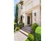 Elegant front entrance with stone facade, manicured landscaping, and a welcoming entryway at 3511 N 39Th Pl, Phoenix, AZ 85018