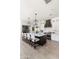 Open kitchen featuring a large island with seating, pendant lights, and a stainless steel oven at 3511 N 39Th Pl, Phoenix, AZ 85018